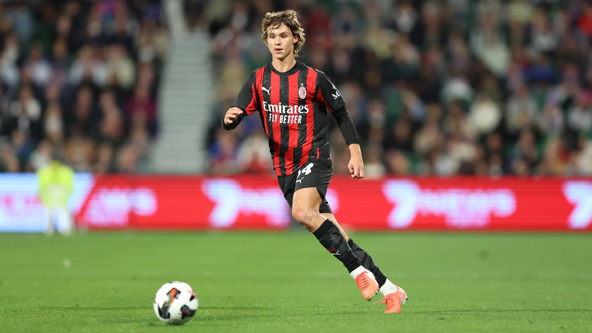 Christian Comotto in azione con la maglia del Milan